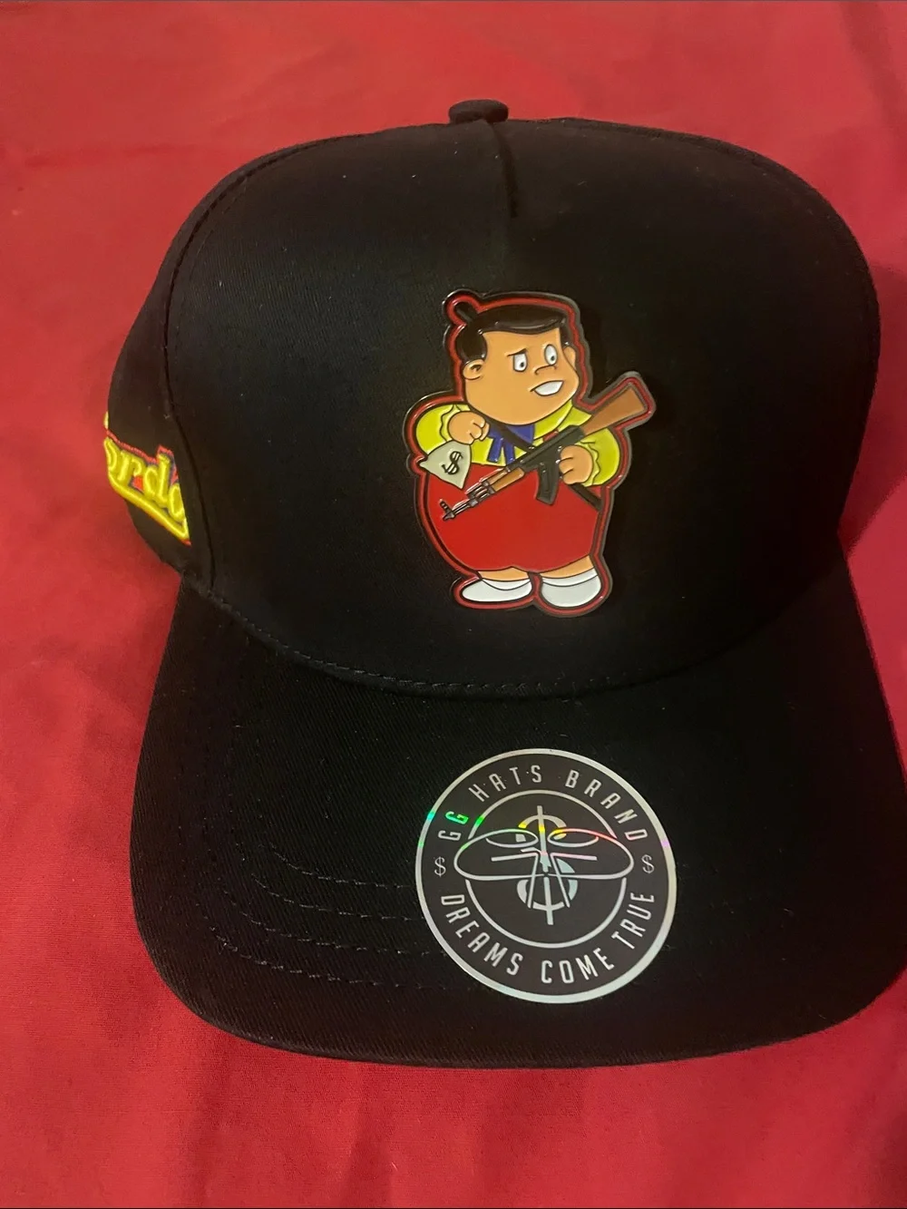Black Trucker Hat with Gordo Metal Patch